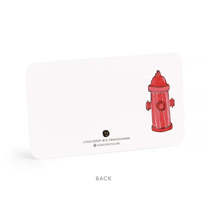 E. FRANCES PAPER's LITTLE NOTES OFF LEASH features 55 mini note cards with a playful dog in a green headband chasing a red ball, perfect for dog mom gifts. Box has a dark blue label.