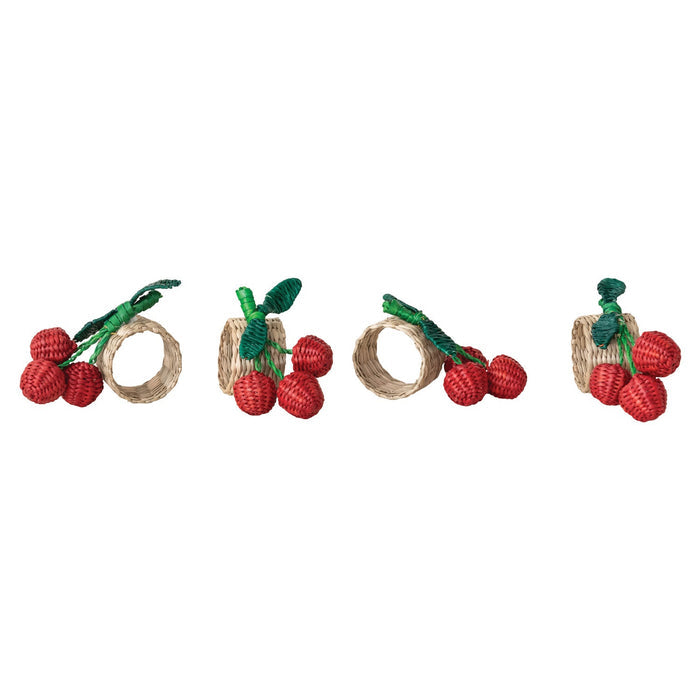 The CREATIVE COOP HAND-WOVEN SEAGRASS CHERRY NAPKIN RINGS, SET OF 4, feature clusters of red cherries and green leaves—ideal as handcrafted table decor and arranged beautifully on any setting.