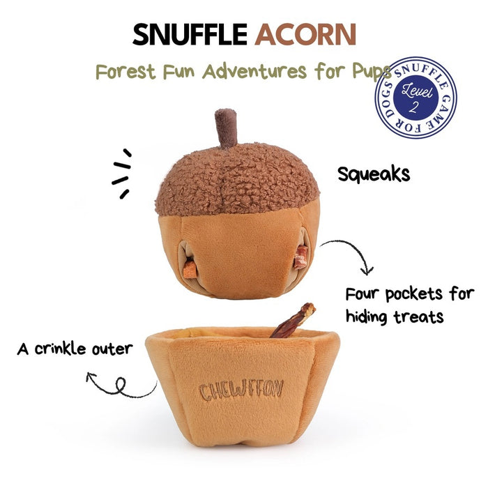 A plush, squeaky dog toy from CHEWFFON shaped like an acorn, featuring a textured brown top and a smooth tan base. The word “CHEWFFON” is embroidered on the base in light brown thread. This toy is called the ACORN SNUFFLE & SQUEAKY DOG TOY.