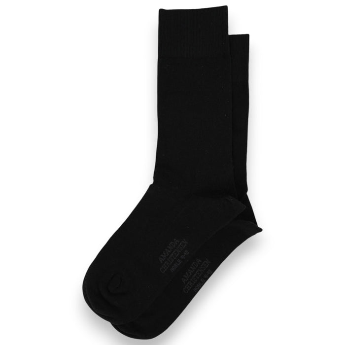 A pair of AMANDA CHRISTENSEN - Noble Cotton & Cashmere Blend Mid-Calf Socks in black, elegantly arranged with one sock neatly stacked atop the other on a white background—an ideal choice for those seeking luxury men’s socks that embody understated elegance.