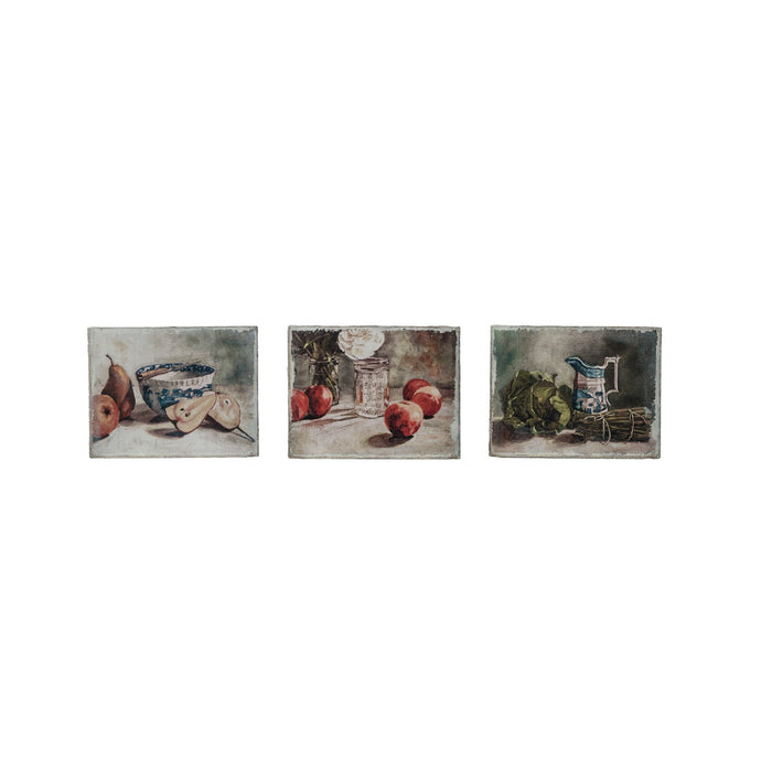 The CREATIVE COOP CANVAS STILL LIFE WITH FRUIT OR VEGETABLES features a blue and white bowl with a spoon, pears, and an apple on a light background—ideal for kitchen wall art or farmhouse décor.