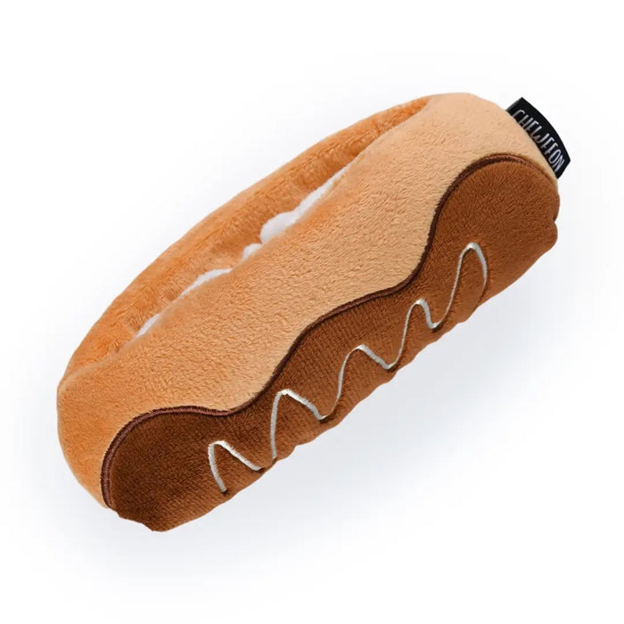 Introducing the CHOCOLATE ÉCLAIR SNUFFLE & CRINKLE DOG TOY from CHEWFFON—a plush, pastry-inspired enrichment toy featuring a soft white interior. This interactive dog toy is gentle on noses and designed for hiding small, colorful treats, encouraging your pup to sniff and search for rewards.