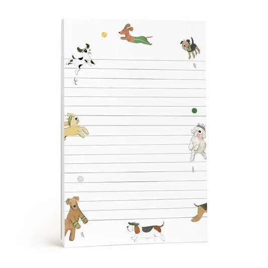E. FRANCES PAPER's NOTEPAD OFF LEASH features lined pages with playful dog and ball illustrations along the edges, making it a perfect stationery gift for dog lovers or pet parents—ample space provided for your notes.