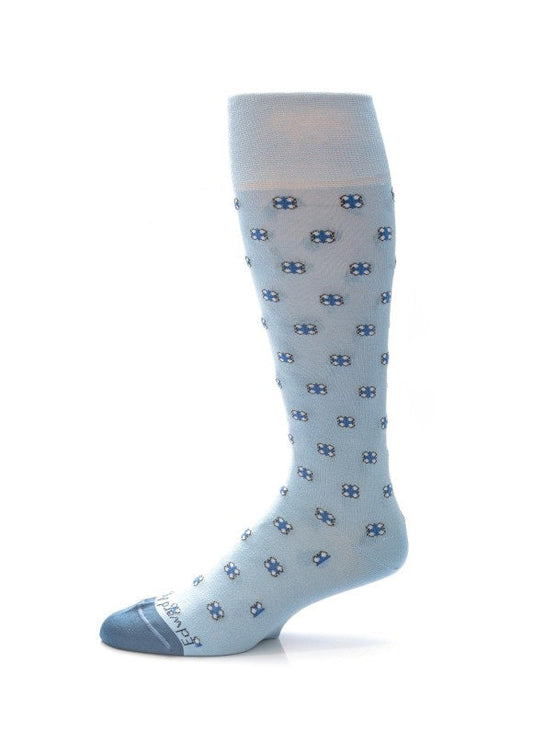 The EDWARD ARMAH ICE BLUE STEEL NEAT SOCKS are light ice blue knee-highs with blue and white flower patterns and a darker blue toe, shown on a white background.