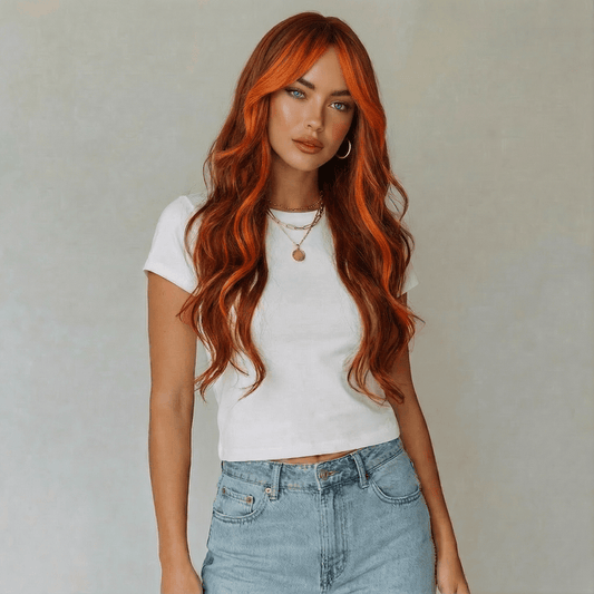 Maisie Long Black Wig with Orange Highlights showcasing flowing waves and a modern look.