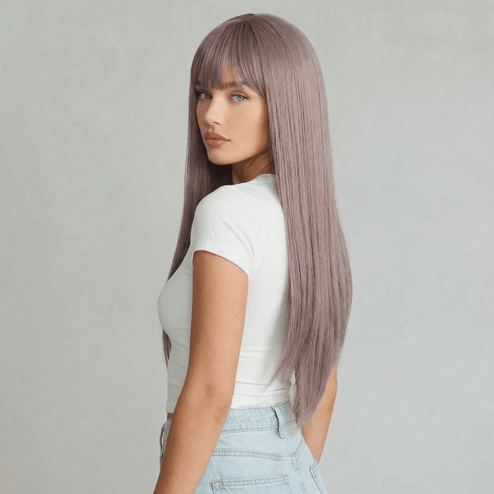 Piper long light purple wig with bangs styled sleekly, showcasing soft brown and light purple hues.