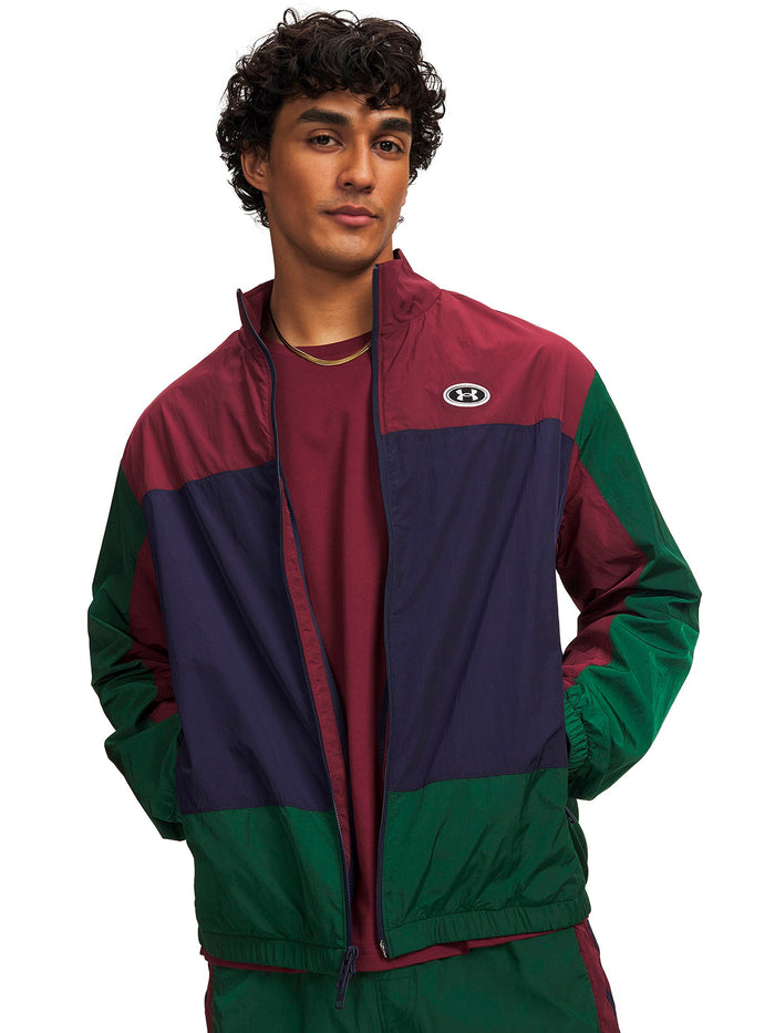 Poleron UA Icon Woven Track verde para hombre