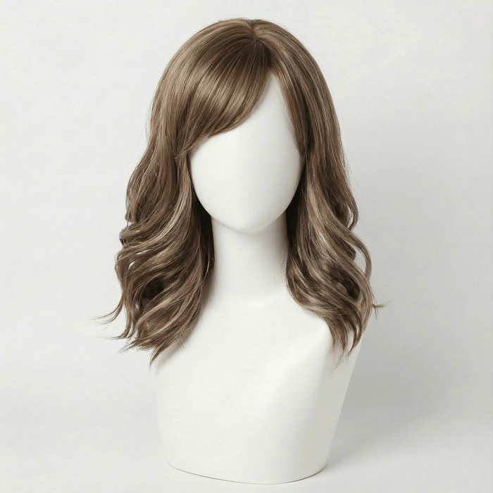 Short brown highlighted wig styled on a mannequin, showcasing soft waves and natural movement.