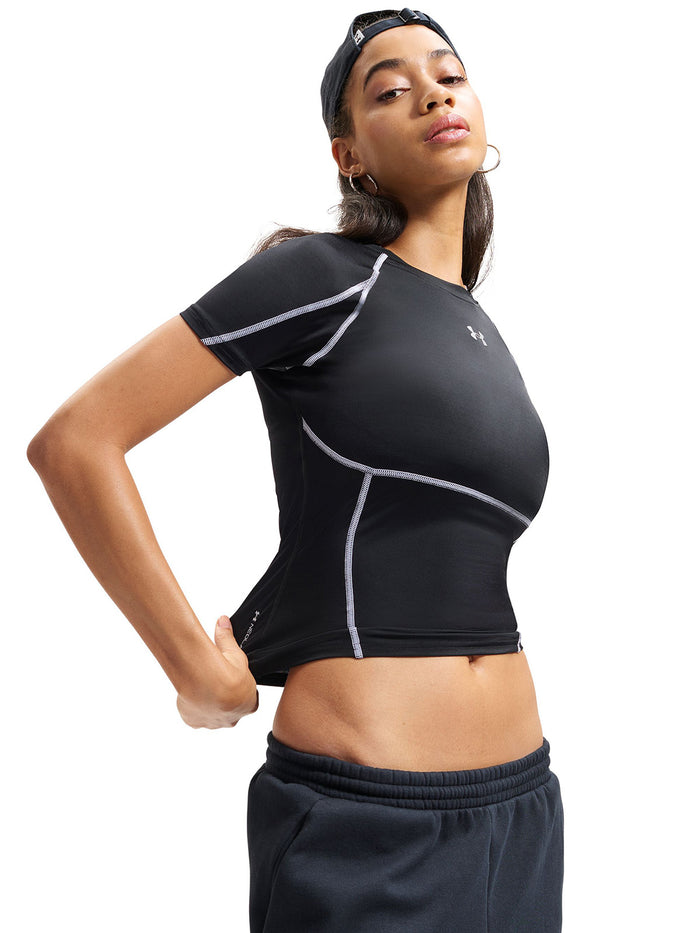 UA HeatGear Elite SS Primera Capa Superior negra para mujer